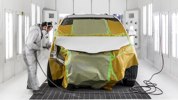Collision Center Technician Painting a Vehicle | Sansone Toyota in Woodbridge NJ